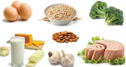 A selection of protein-rich foods including eggs, oats, broccoli, milk, cheese, butter, almonds, garlic and tuna